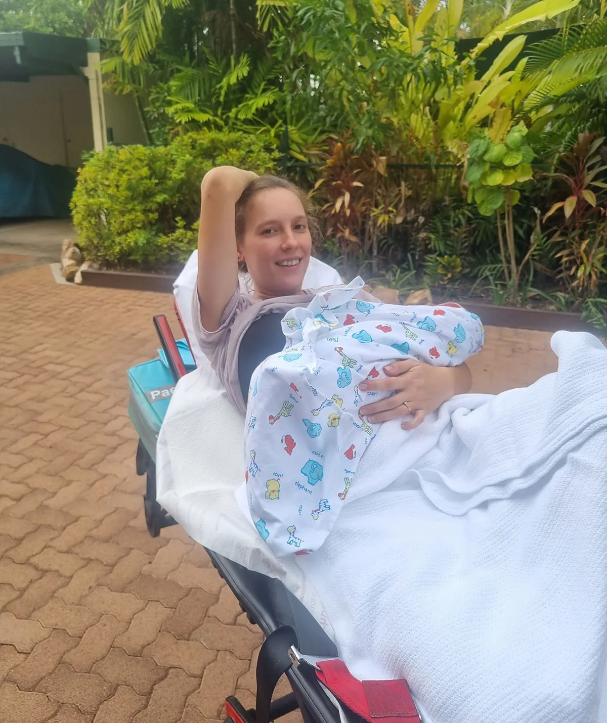 Me and Dawn on an ambulance stretcher shortly after birth. (Image: Supplied)