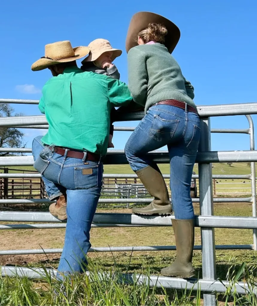 Brad and Clare with baby Roy on the Farm