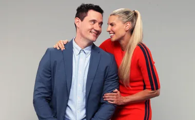 Ed Kavalee and Tiffiny Hall looking at each other