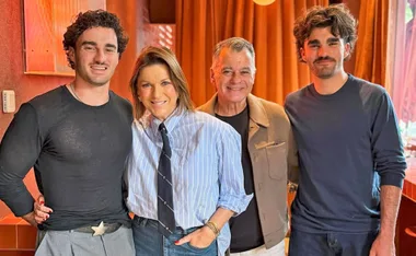 Kylie Gillies from The Morning Show pictured with her husband Tony and two sons, Gus and Archie.
