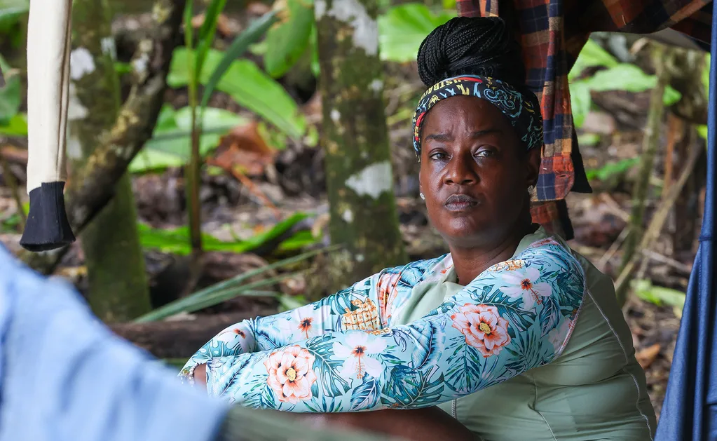Cirie, wearing a floral top, looks thoughtful while in Samoa.