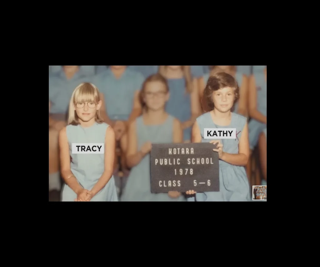 Two young girls in their school class photo.