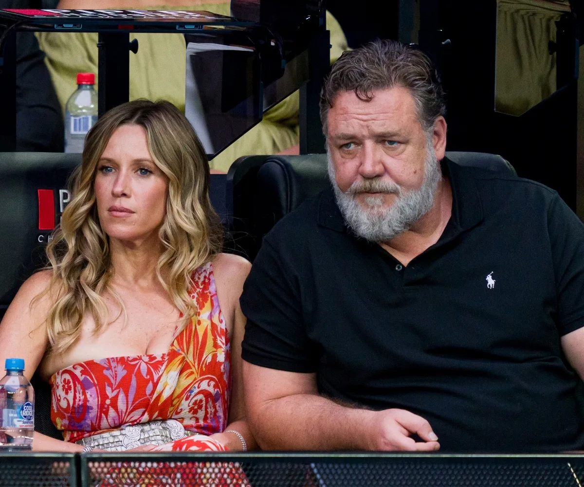 A man and woman sitting next to each other