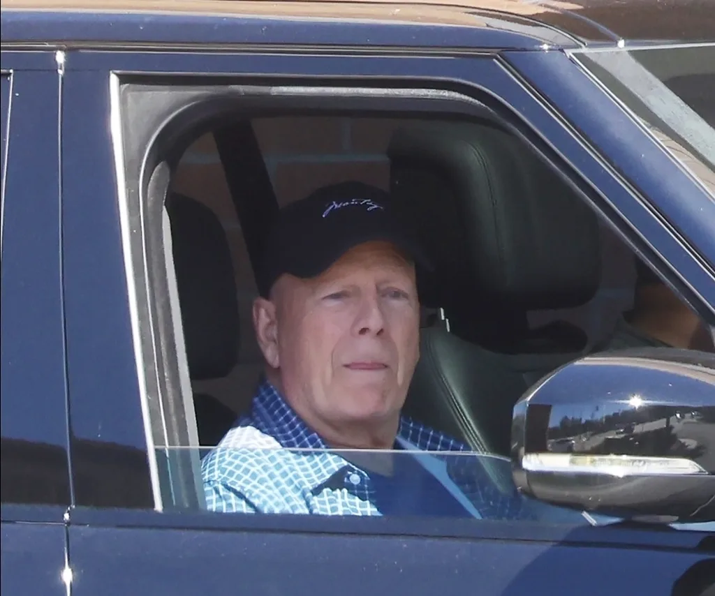 A man sitting in a car.