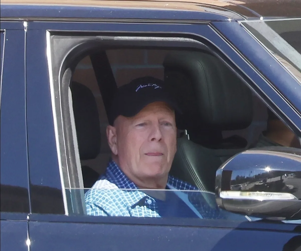 A man sitting in a car.