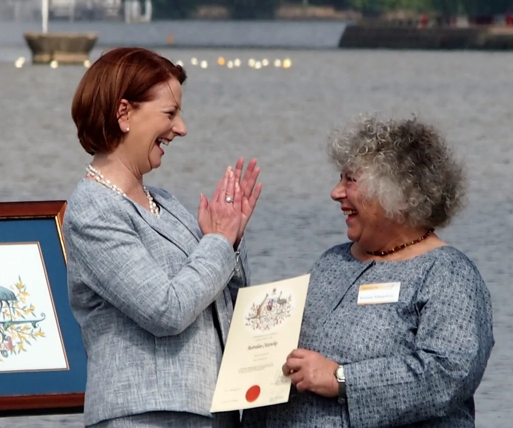 Two woman smile and laugh.