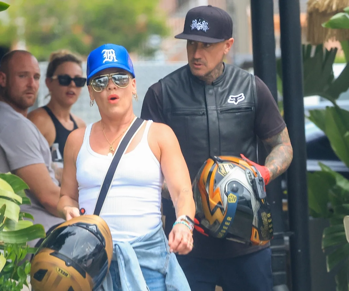 A man and a woman walking.