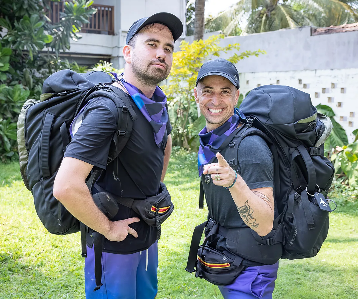 Luke and 'Sassy' Scott posing with their backpacks on for The Amazing Race: Celebrity Edition 2025.