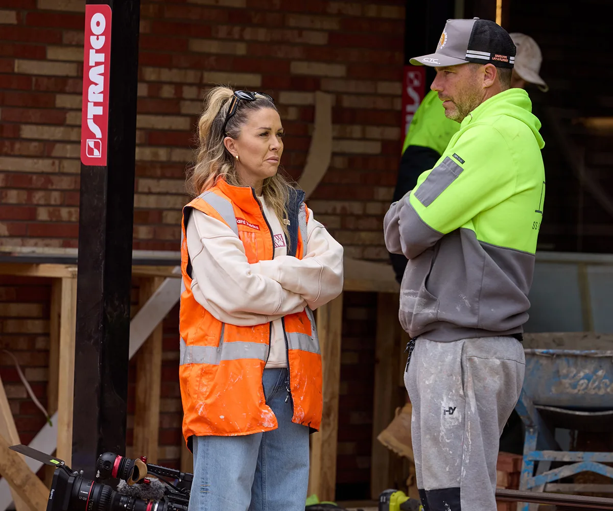Alicia and Sonny with crossed arms looking upset on site while filming The Block 2025.
