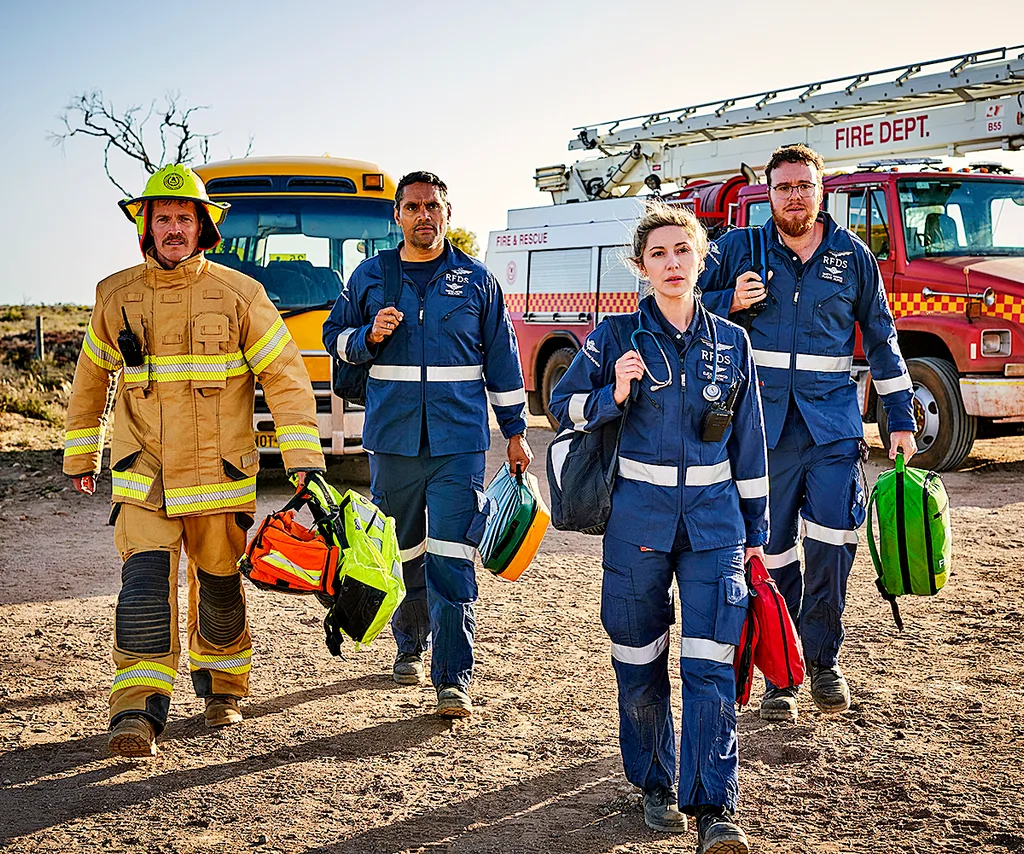Eliza leads the RFDS team in uniform into action in season 3 of RFDS.