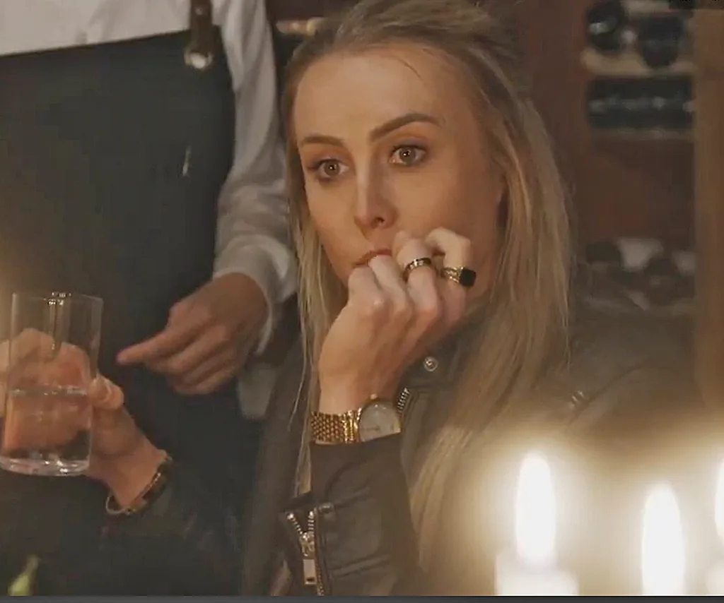 Han at the Lakehouse dinner on The Block with her head in hands looking upset.