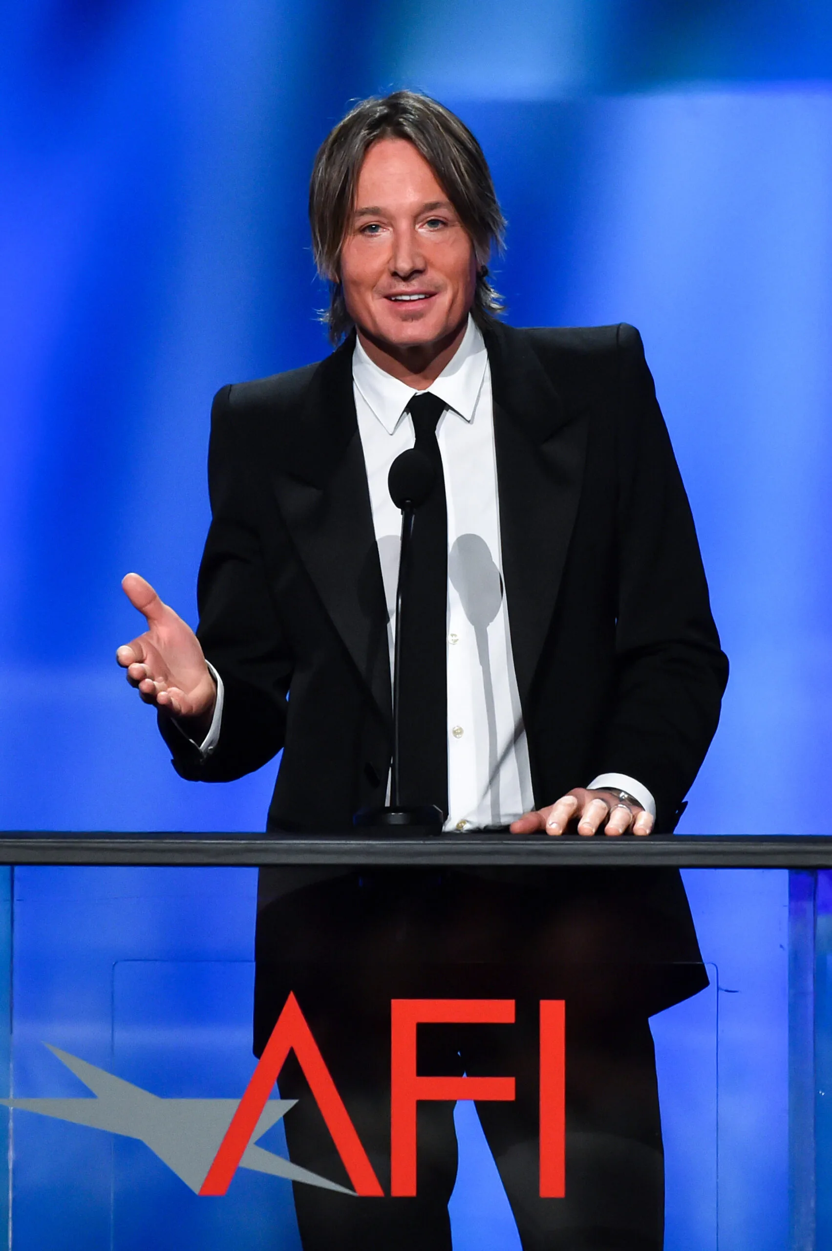 Keith Urban spoke onstage during the 49th AFI Life Achievement Award Gala Tribute celebrating Nicole Kidman at Dolby Theatre on April 27, 2024.