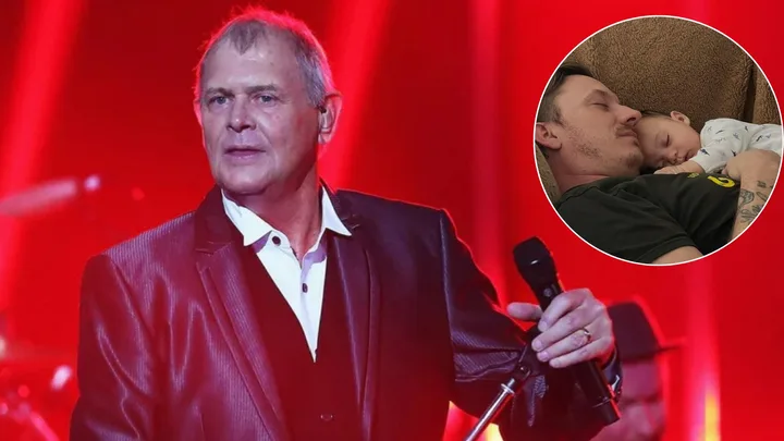 John Farnham and James Farnham with his new baby