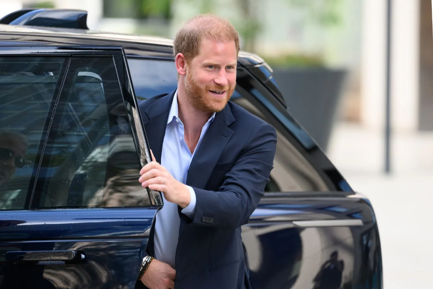 Prince Harry exits a car on September 10, the day he reunited with his father