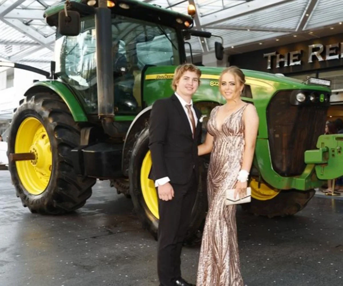 Tom and I arriving at the formal with the tractor. (image: Supplied)