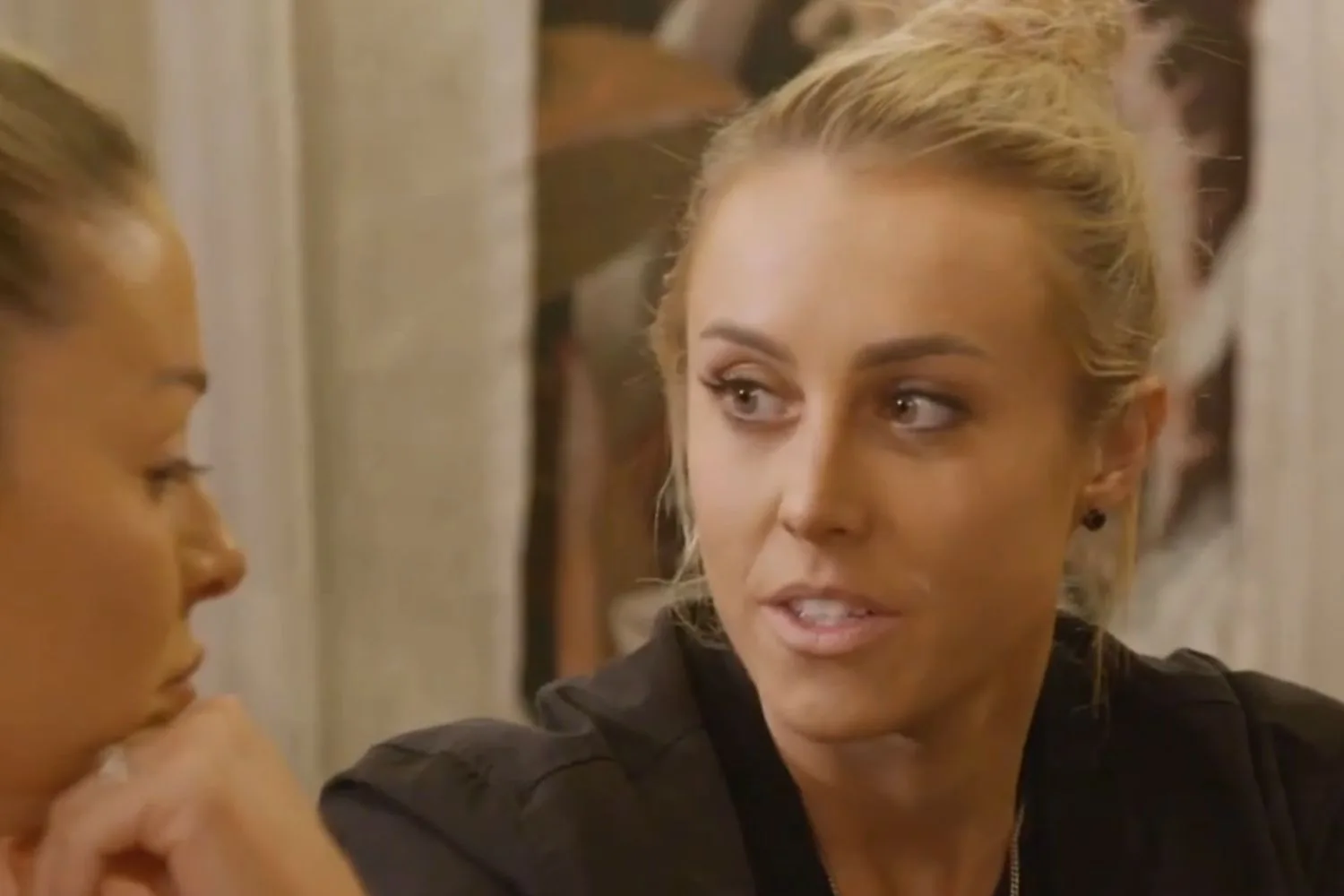 Han looks awkwardly at Alicia from The Block