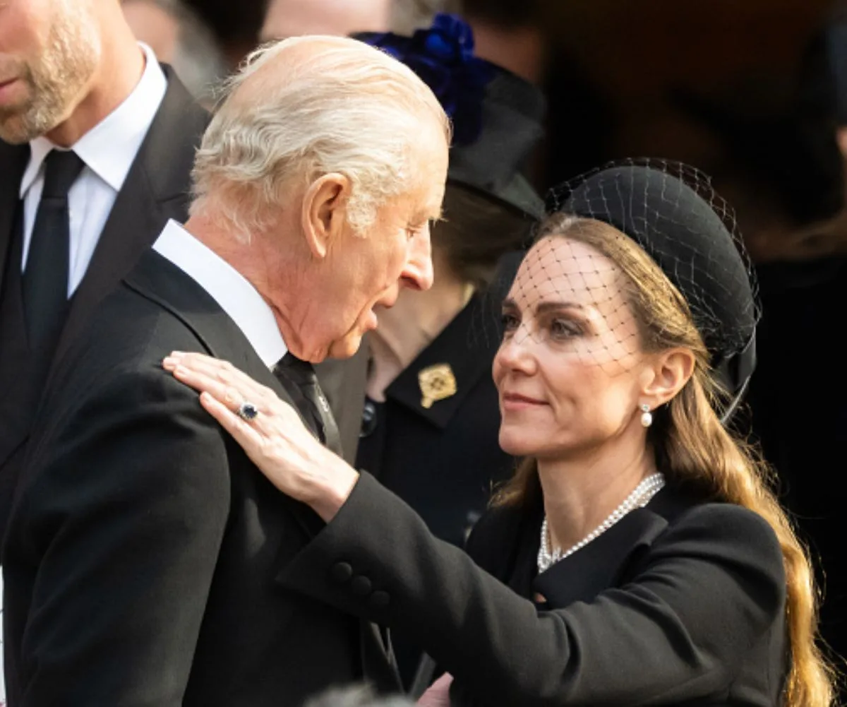 The Princess of Wales was seen comforting King Charles III as senior members of the royal family farewelled Katharine, Duchess of Kent. (Image: Getty)