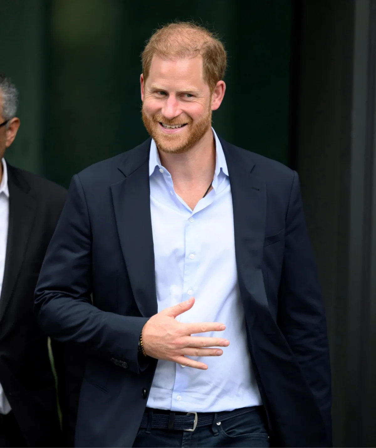 Happy Harry! The Prince beamed as he told reporters that his father is "great". (Image: Getty)
