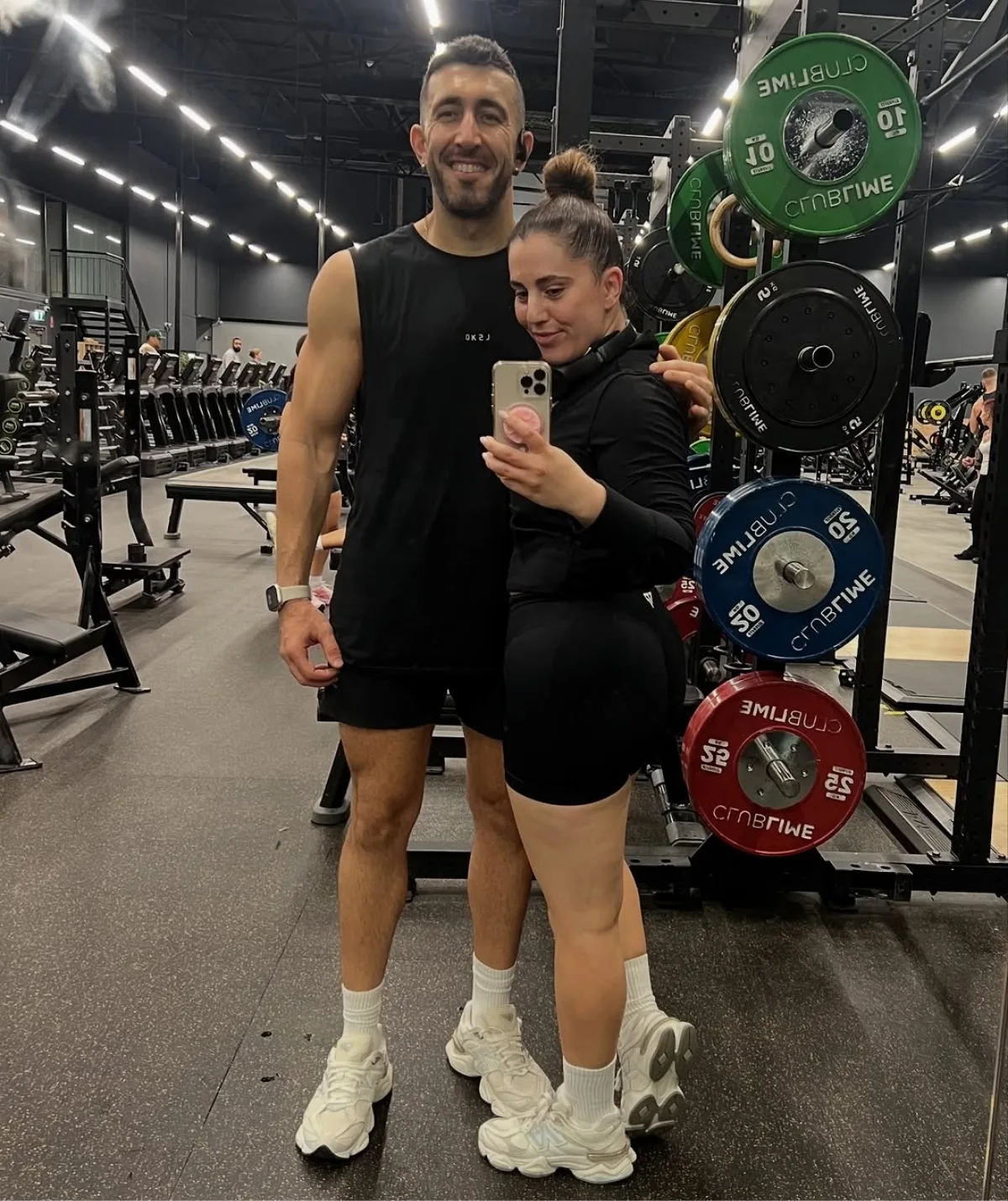 Sarah and George train at the gym together.