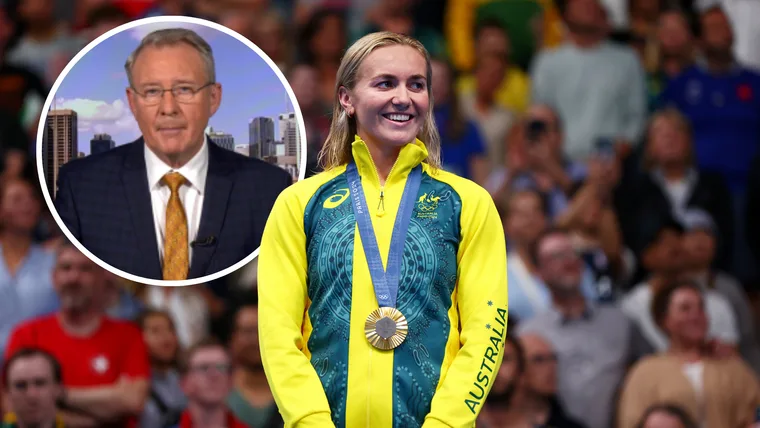 Ariarne Titmus winning gold medal at olympics