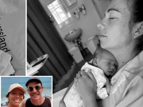 Farmer David and Emily and their baby