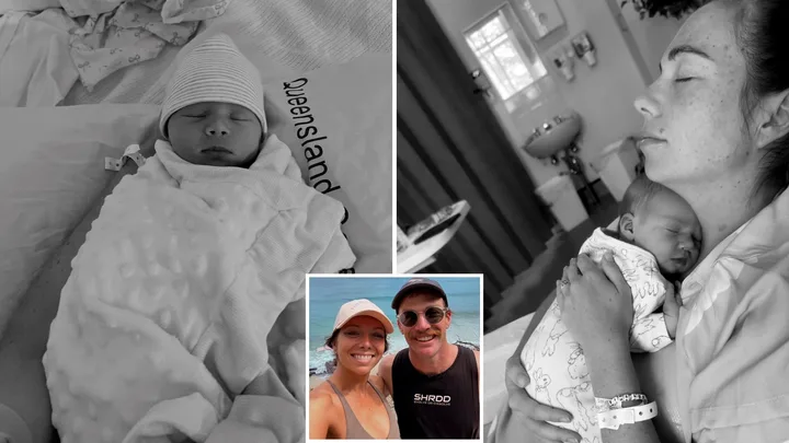 Farmer David and Emily and their baby