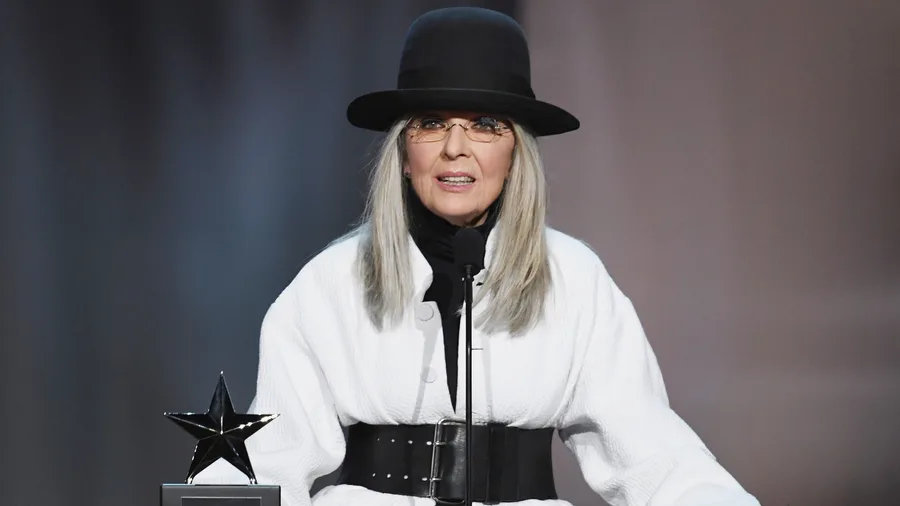 Diane Keaton accepts an award onstage.