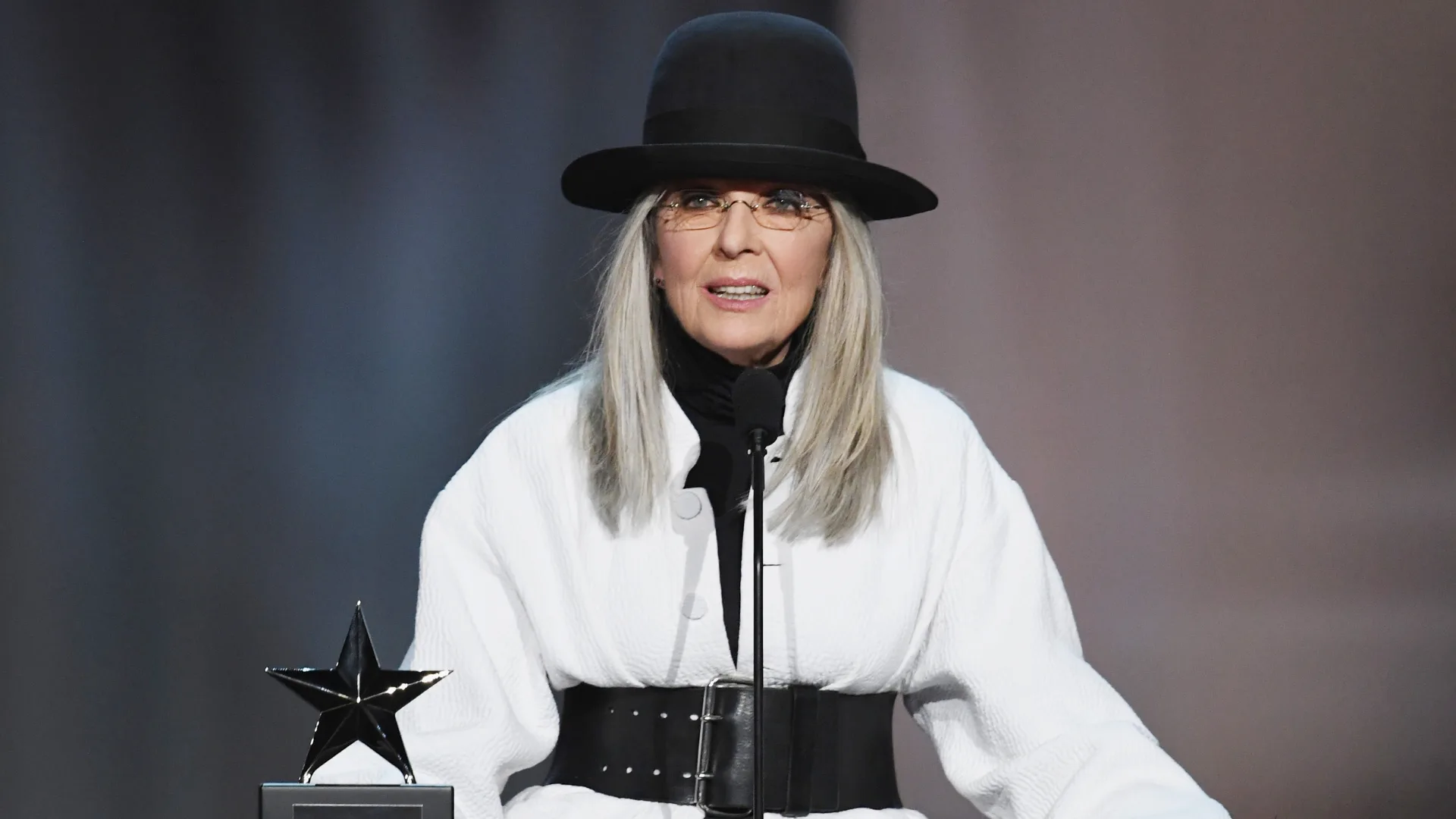 Diane Keaton accepts an award onstage.