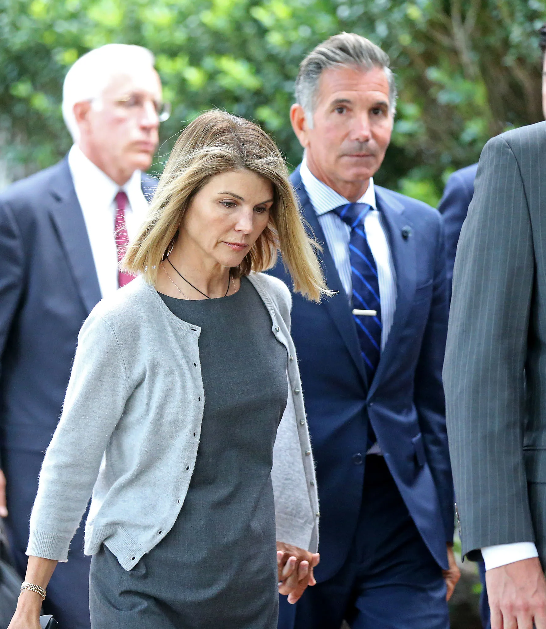 Actress Lori Loughlin and her husband Mossimo Giannulli leave Moakley Federal Courthouse after a brief hearing  on August 27, 2019 in Boston, MA.   