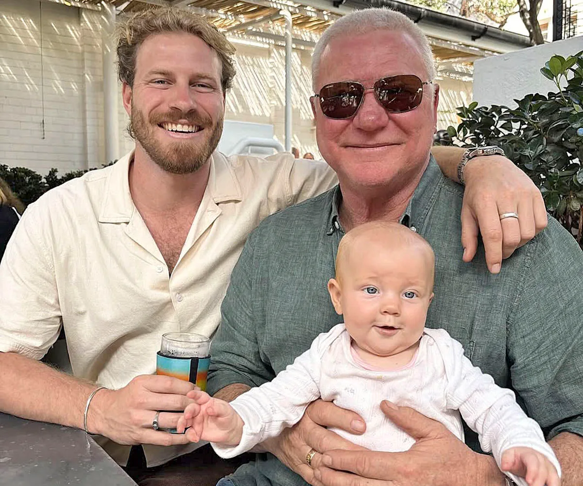 The Block's Scott (centre) with son Charlie and baby Tiggy