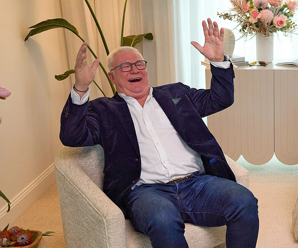 Scott Cam in the auction room of The Block celebrating a win.