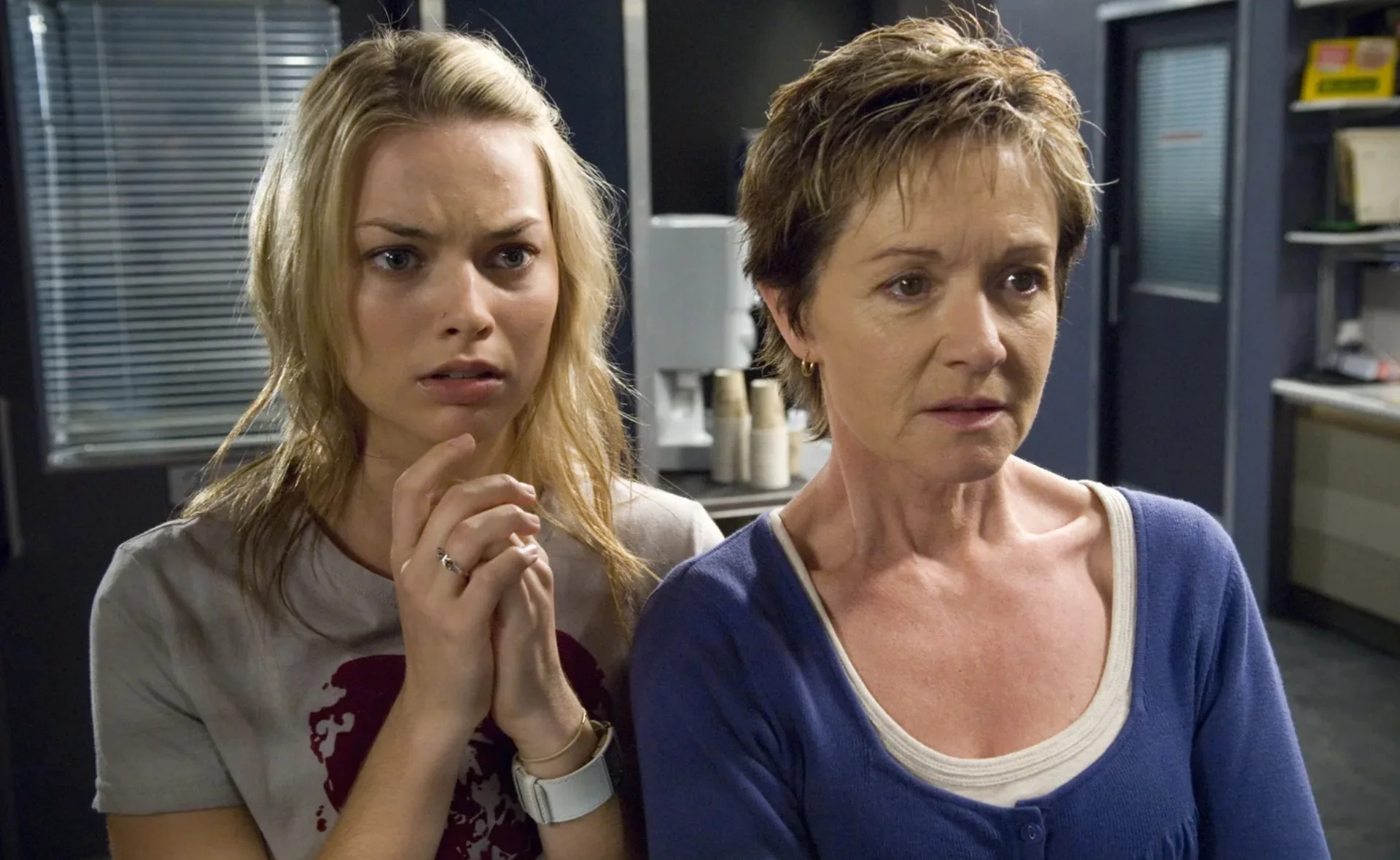 Margot robbie on the set of Neighbours looking shocked