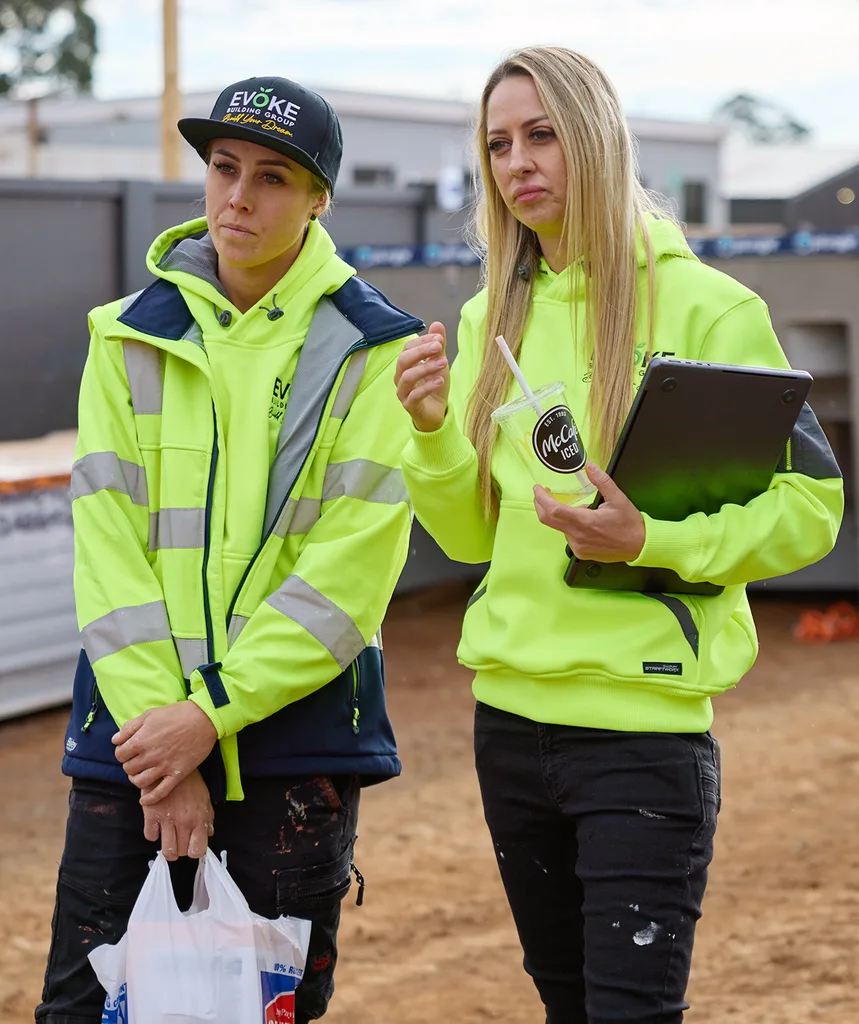 Han and Can on site of The Block 2025 in hi-vis.