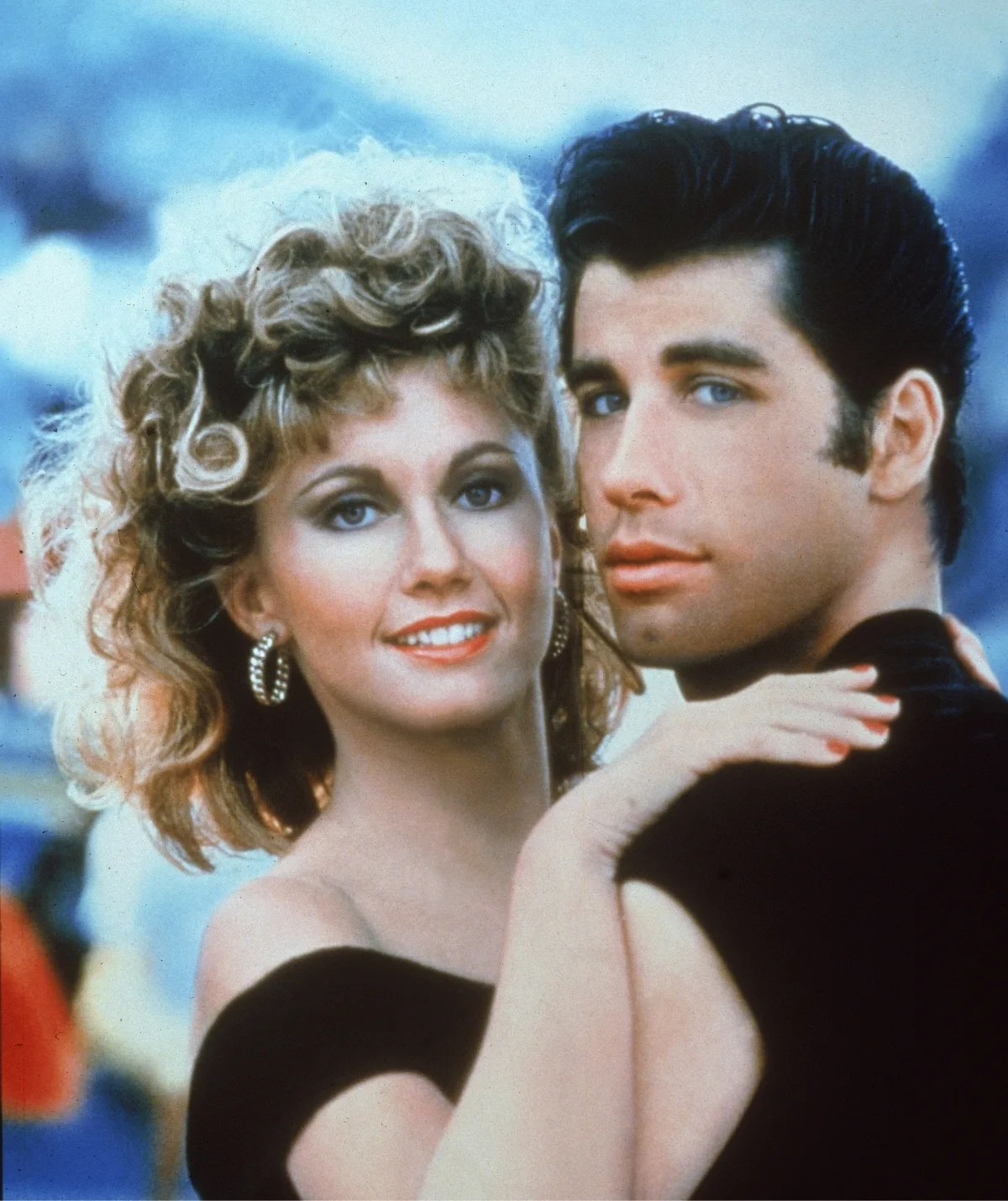 Olivia and John in Grease.
