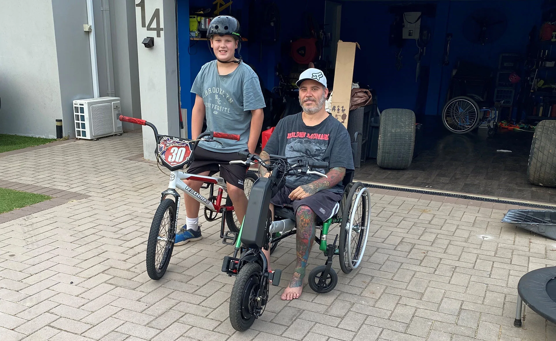 Chris and his son Jeremy. (Image: Supplied)