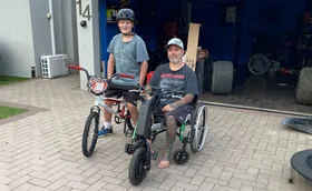 Chris and his son Jeremy. (Image: Supplied)