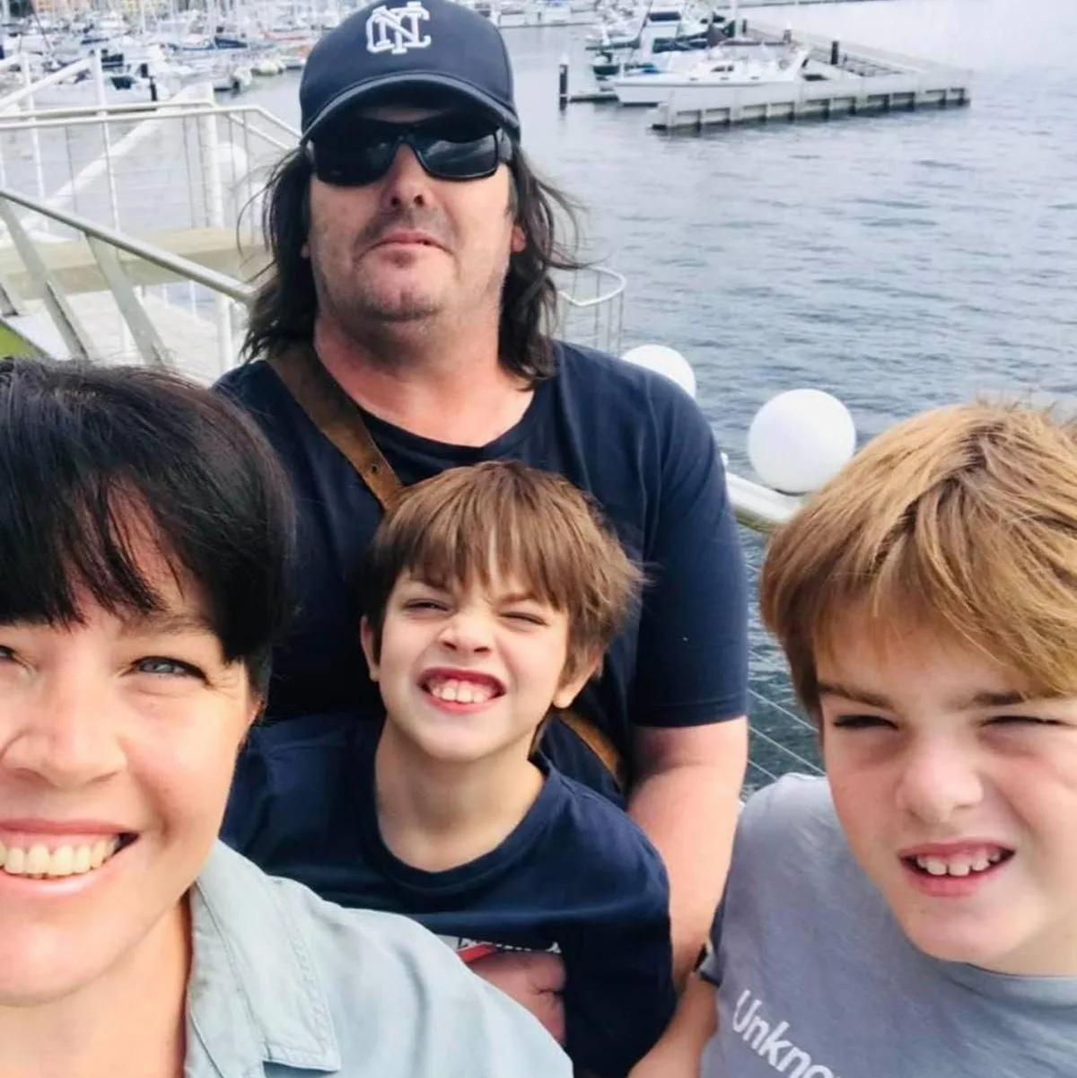 Katrina and I with their sons Oliver and Charlie. (Image: Supplied)