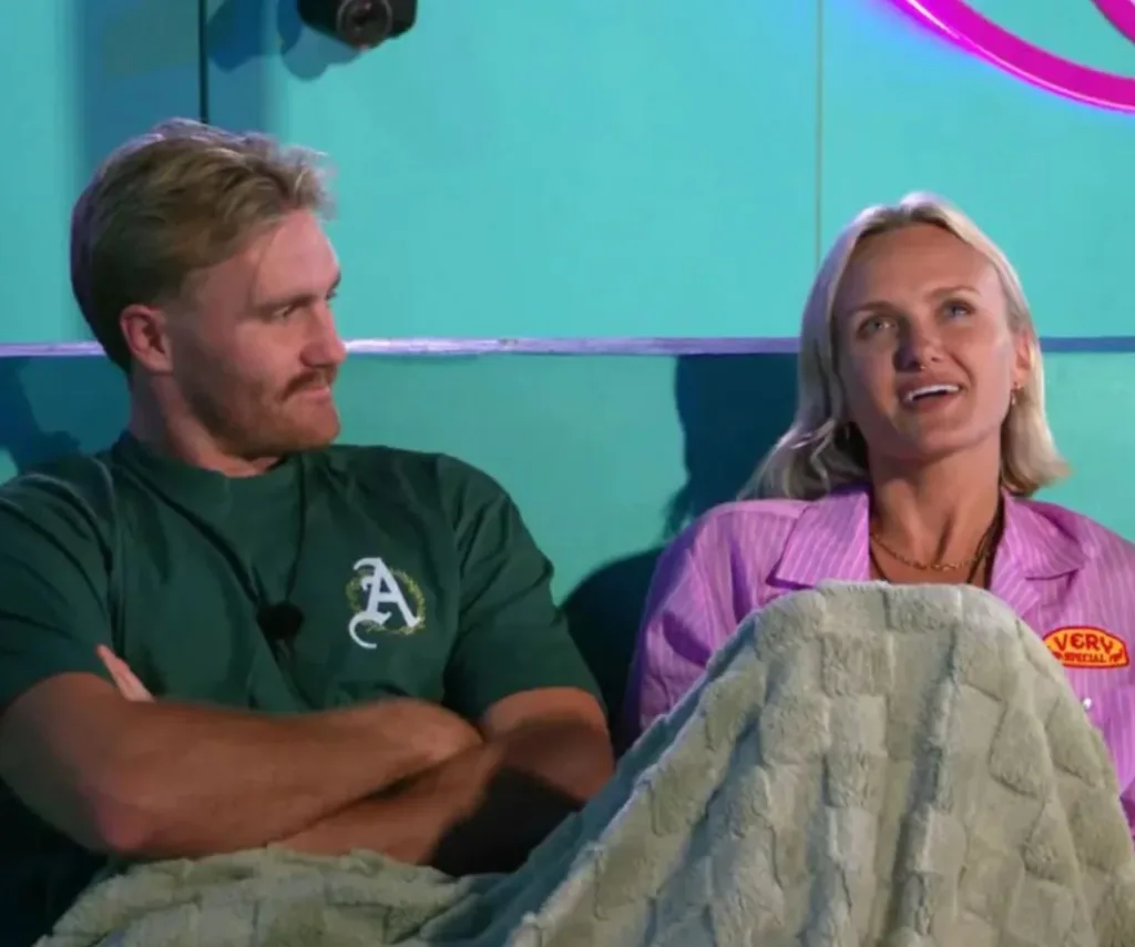 Bruce and Coco in the backyard of the Big Brother Australia house having a chat.