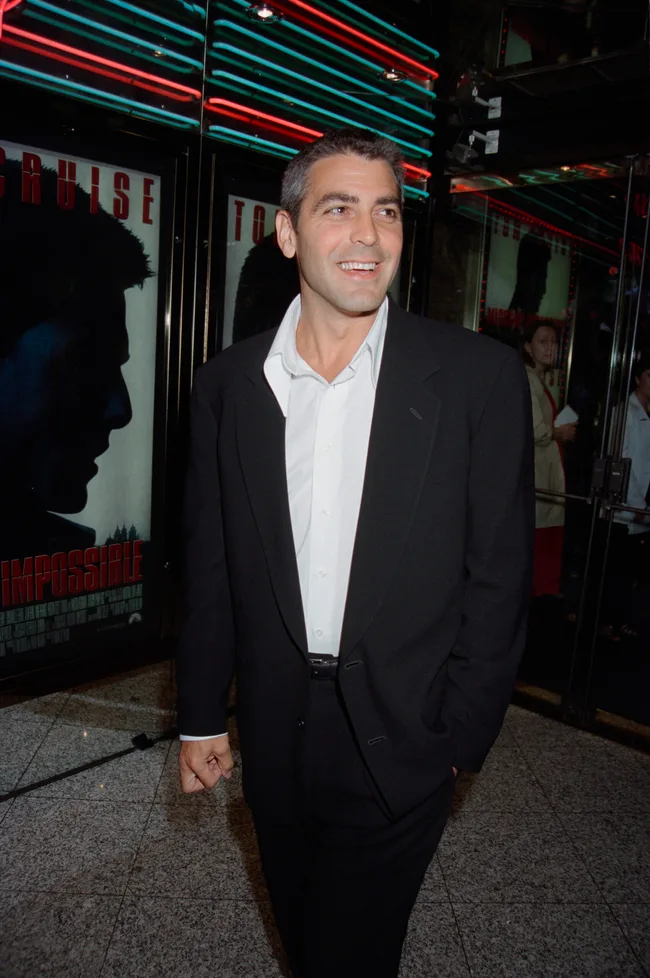 American actor George Clooney attends the UK film premiere of Brian De Palma's 'Mission Impossible' at the Empire cinema, Leicester Square, London, July 1996.