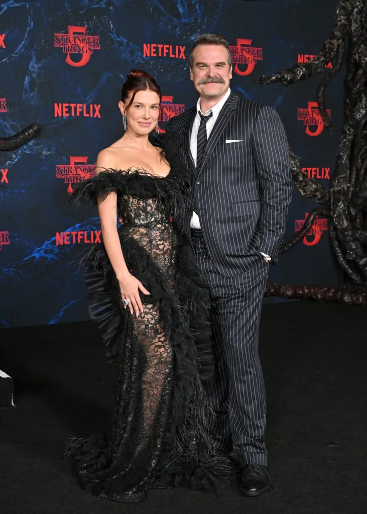 Millie Bobby Brown and David Harbour attend the Los Angeles Premiere of Netflix's "Stranger Things" Season 5 at TCL Chinese Theatre on November 06, 2025 in Hollywood, California.