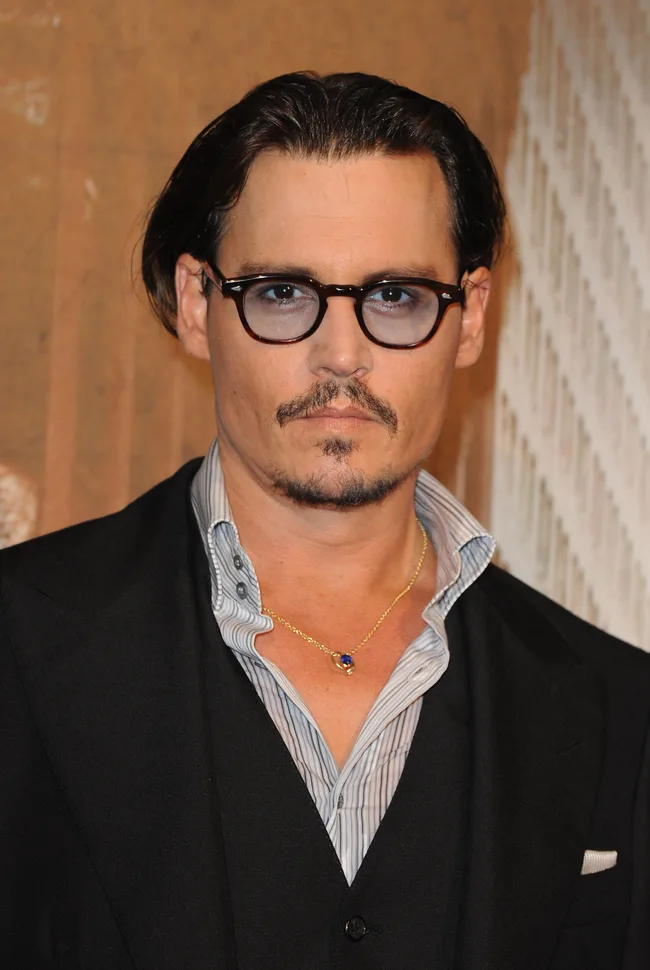 PARIS - JULY 02: U.S Actor Johnny Depp attends the "Public Enemies" film premiere at Cinema Gaumont Marignan on July 2, 2009 in Paris, France. (Photo by Pascal Le Segretain/Getty Images)