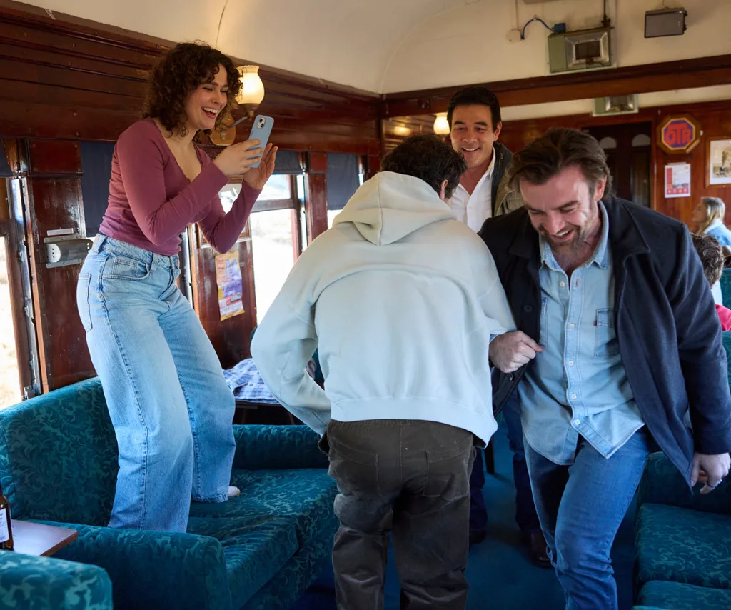 Train passengers enjoy themselves ahead of the Off The Rails festival.