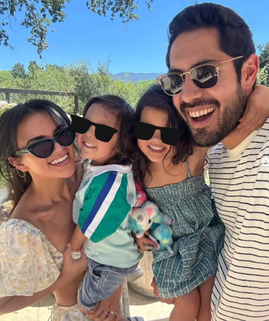 Fely, the kids and Tai smile for a family pic!