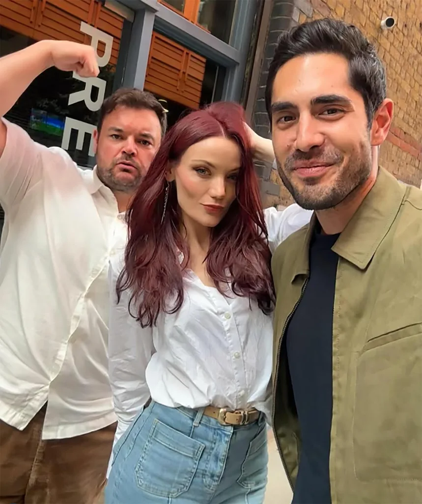 Lloyd Griffith, Anna Samson, Tai Hara pose for a selfie.