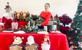 Amy Drayton with some of her Christmas decorations found in dumpsters. (Image: Supplied)