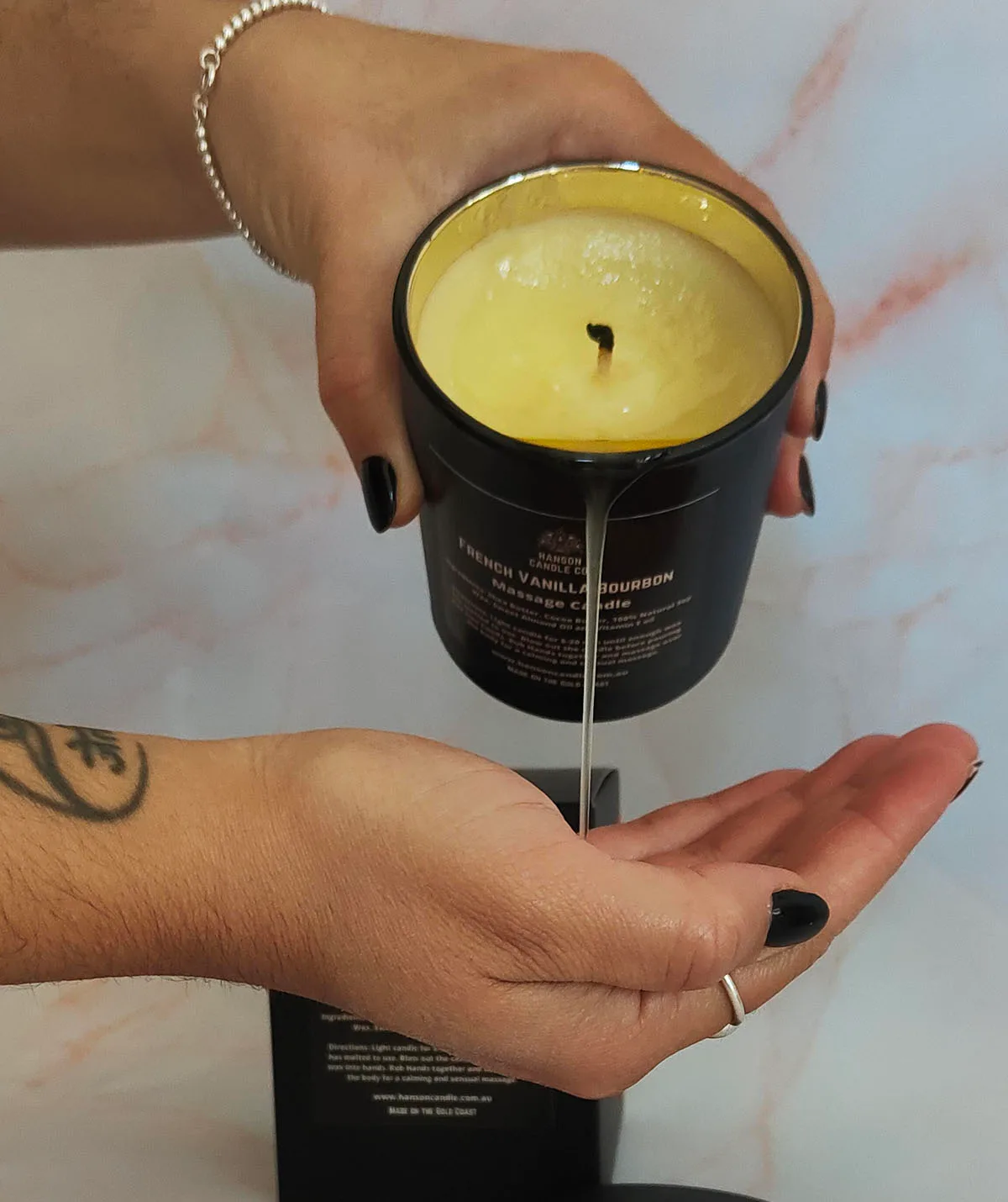 Our Massage Candle French Vanilla Bourbon in Black. (Image: Supplied)