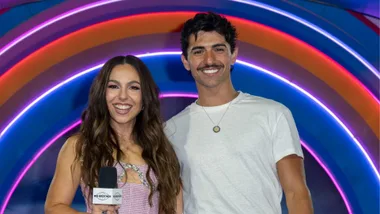 BIG BROTHER HOST MEL TRACINA WITH CONTESTANT VINNIE.