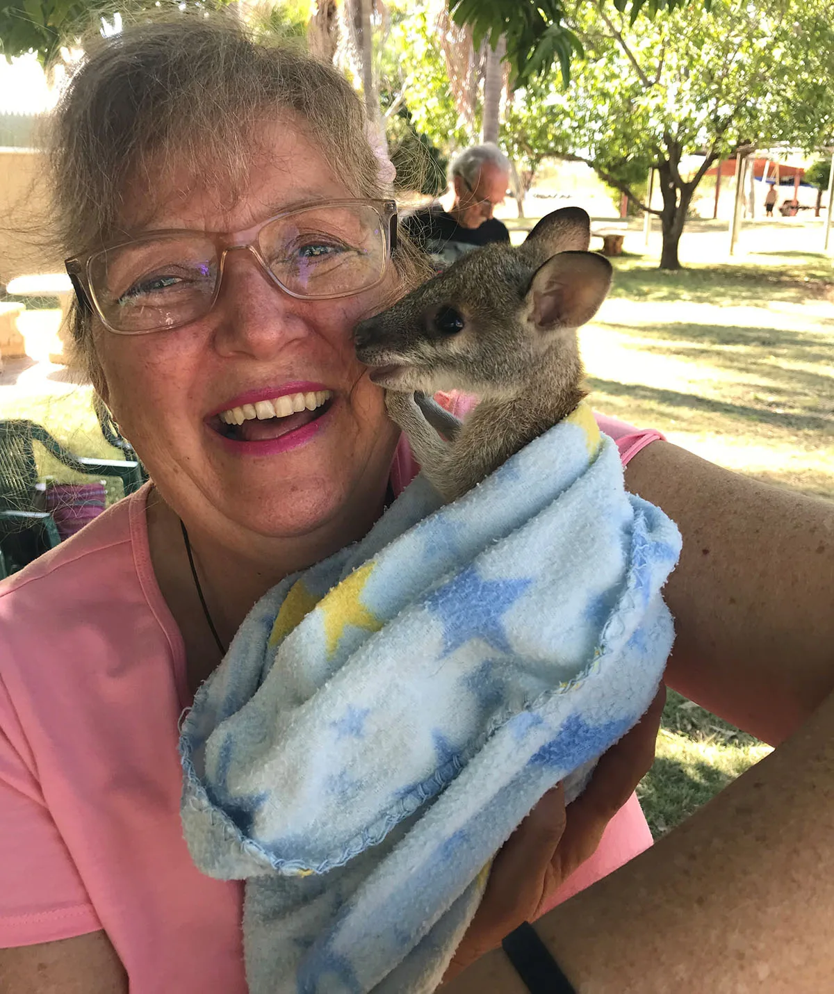 I got to cuddle a baby kangaroo at the Top Didj Aboriginal Cultural Experience & Art Gallery in Katherine, Northern Territory, 2018. (Image: Supplied)