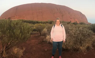 Elaine Schnelle walking around the Base of Ayers Rock, 2018. (Image: Supplied)