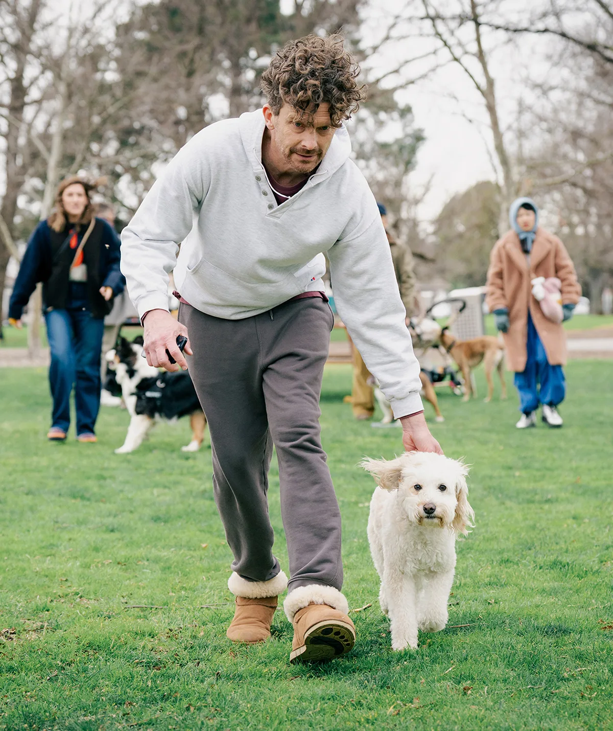 Beattie with owner Roland (Leord Ford) in Dog Park.